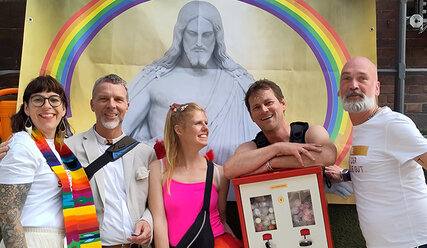 Eine Gruppe von Pastor*innen beim CSD - Copyright: st. moment